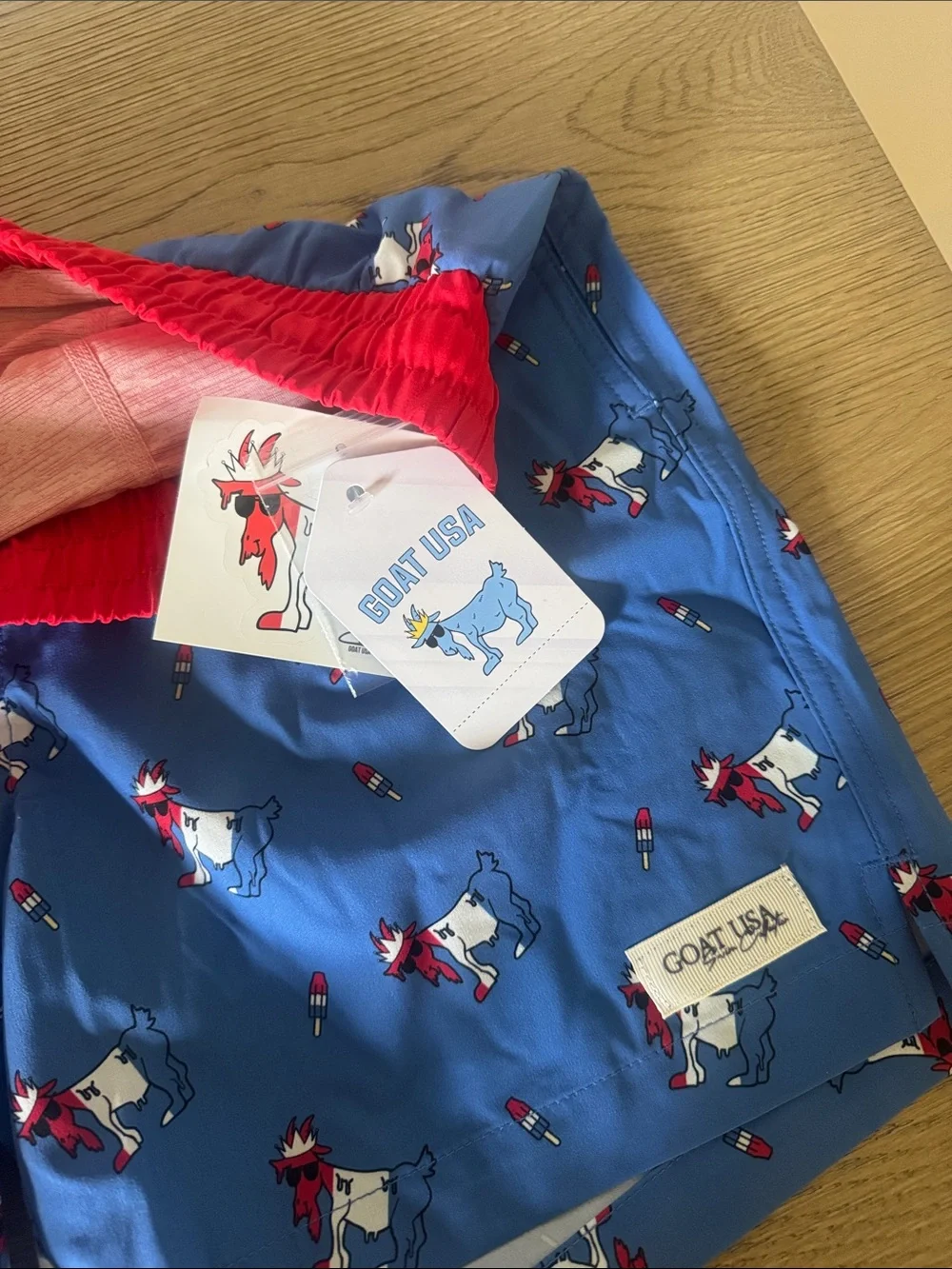 GOAT USA youth XL Boys' Blue Swim Trunks with Red Waistband